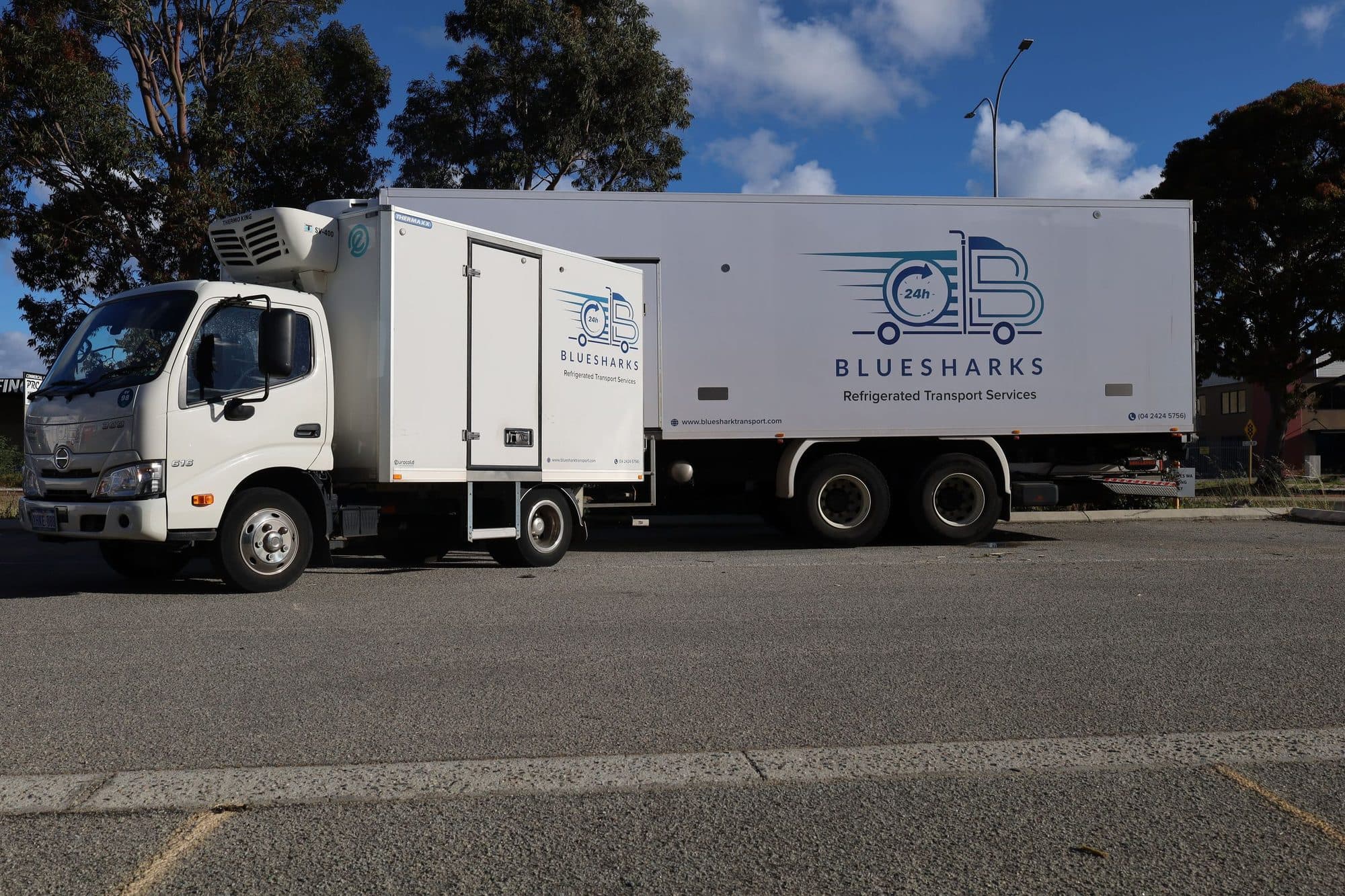Bluesharks24H branded refrigerated truck parked in Perth
